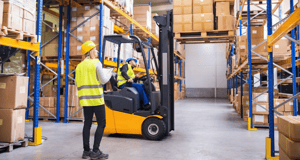 Employees using forklift