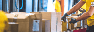 Employee helping label items