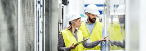 Workers examining facility